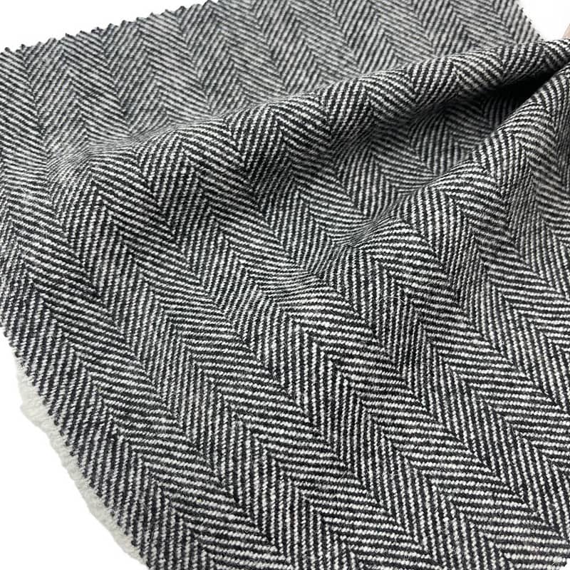 Tessuti classici in lana / poliestere a spina di pesce nero bianco jacquard morbidi al tatto per abbigliamento ZZH24020